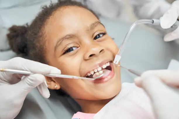 Dentist with patient in modern dental